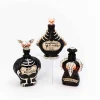 Set Of 3 Battery Operated Lighted Resin Halloween Potion Bottles